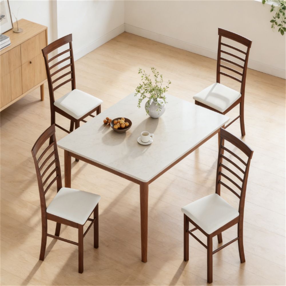 A set of four wooden dining chairs, kitchen chairs, living room chairs