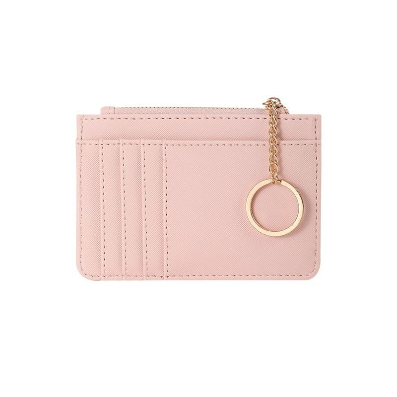 This slim wristlet card wallet is a minimalist essential! Multiple card slots + zipper coin pocket, detachable key ring for easy carrying.