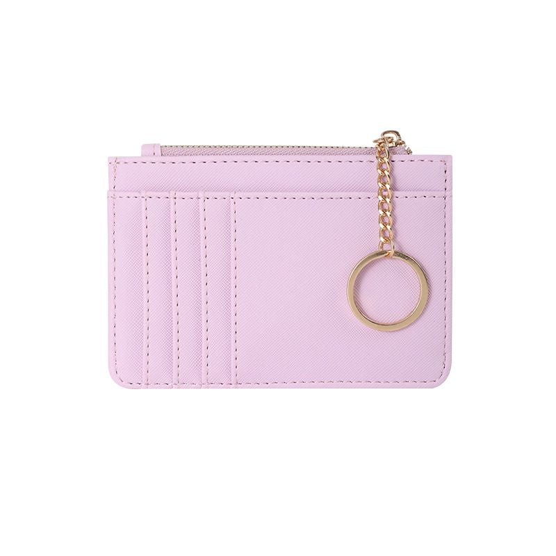 This slim wristlet card wallet is a minimalist essential! Multiple card slots + zipper coin pocket, detachable key ring for easy carrying.