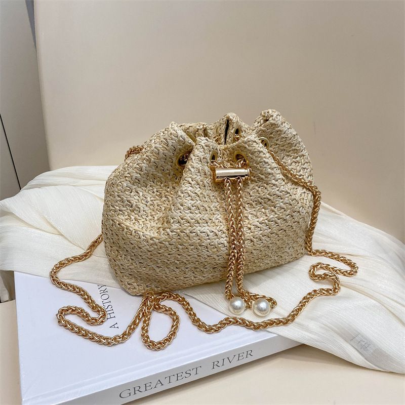 Women Mini Straw Bucket Crossbody Bag, Hand Woven Drawstring Straw Purse with Pearl Decor, Gold Chain Shoulder Bag for Summer Beach Vacation